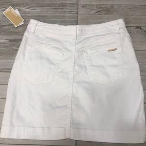 MICHAEL Michael Kors Skirts - 2 left . 🆕 Michael Kors White Denim Mini Skirt MICHAEL Michael Kors Skirts - 2 left . 🆕 Michael Kors White Denim Mini Skirt